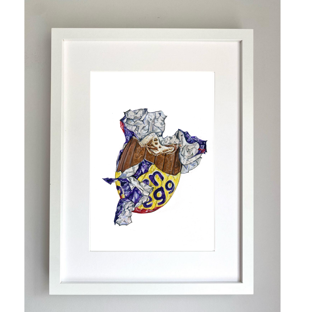 An A4 sized print of a cream egg painting with colorful details, framed in a white frame.